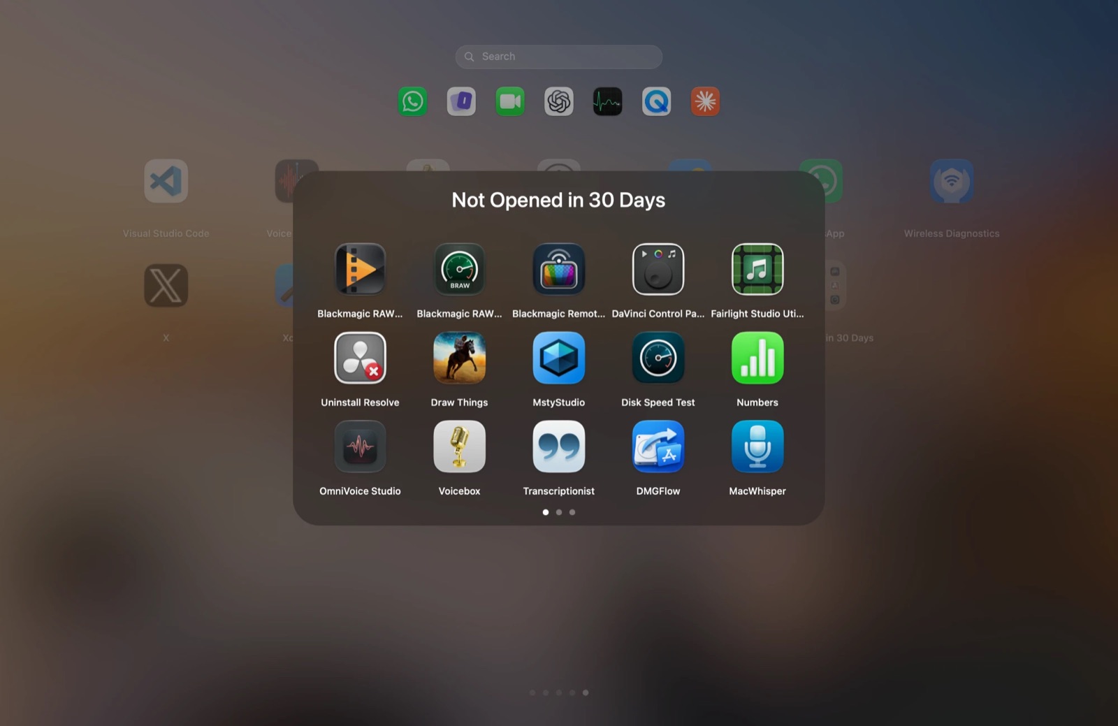 Vehla's Launchpad on macOS 26 showing the Not Opened in 30 Days smart folder over the blurred desktop